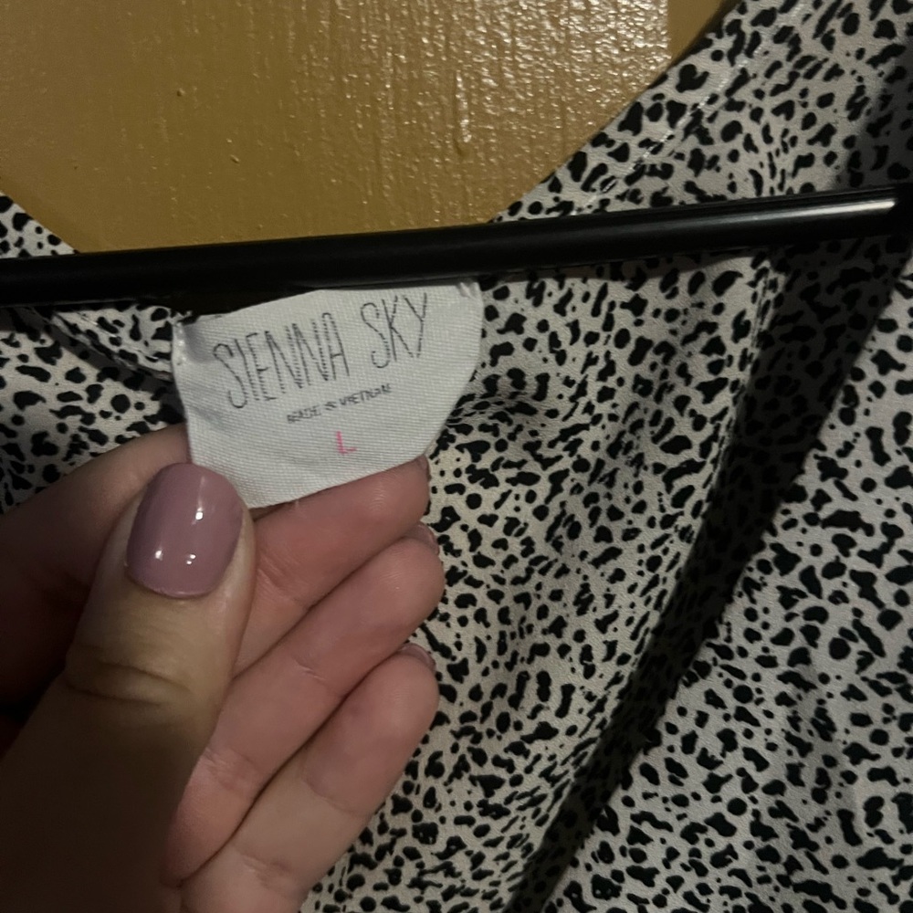 Sienna Sky cheetah print size L top